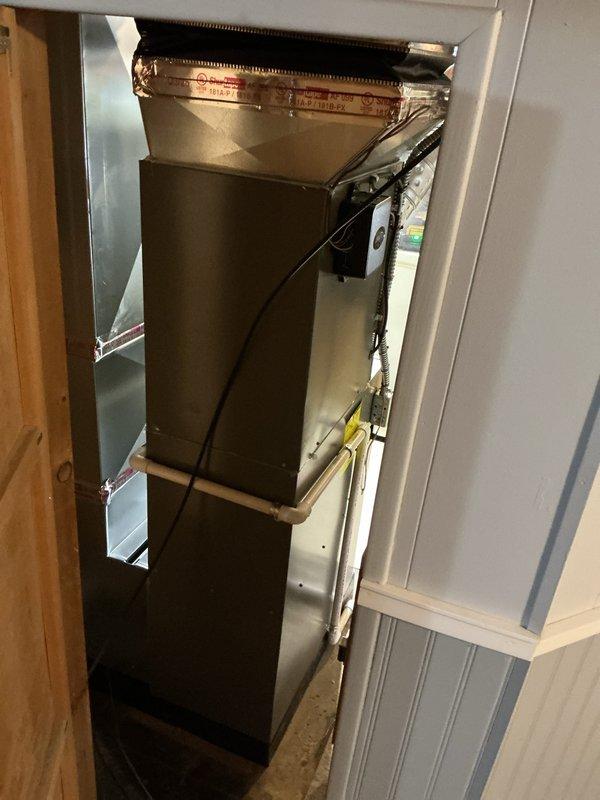 Successfully installed a complete HVAC system consisting of a 70,000 BTU furnace and 2-ton AC unit with proper ductwork connections. System was professionally mounted in utility area with all electrical components reconnected, and mechanical permits were obtained as required for the installation.