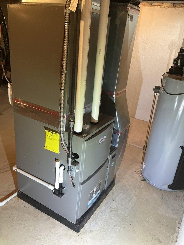 Performed annual heating maintenance on residential furnace system per membership agreement. Conducted full inspection of furnace unit, associated ductwork, PVC ventilation pipes, and connections in basement utility area. System appears to be properly installed and in normal working condition with no visible damage, leakage, or unusual wear; documentation updated to reflect continued maintenance coverage through 2025.