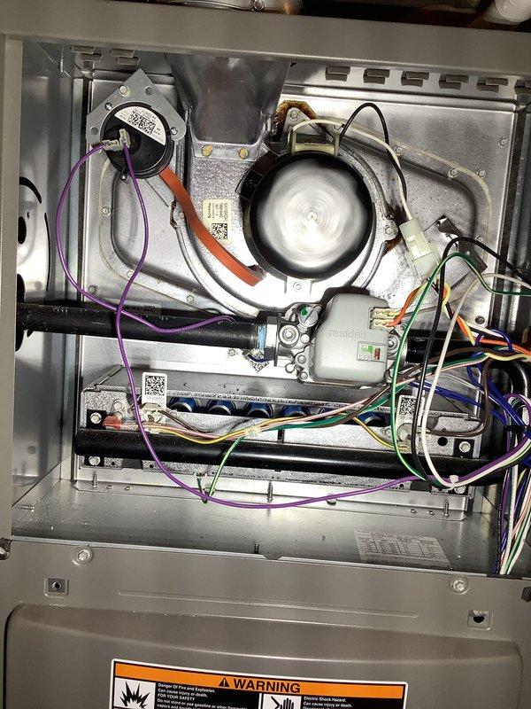 Performed routine air handler maintenance on recurring service contract with Air Care Heating. Inspected burner assembly, confirming proper flame pattern and operation of Resideo control module. Examined blower wheel and motor assembly, checked all electrical connections, and verified proper operation of all system components.