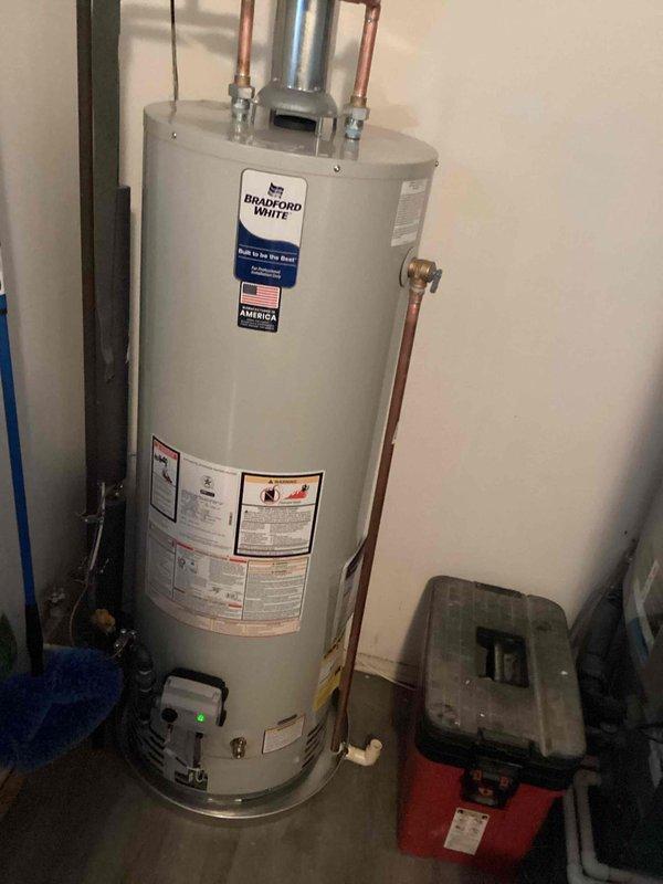 Successfully installed a 40-gallon Bradford White tanked water heater with all required mechanical connections. Completed proper venting with galvanized metal ductwork and connected copper supply lines with appropriate fittings. All permit requirements were fulfilled for mechanical work and hot water heater reconnection.