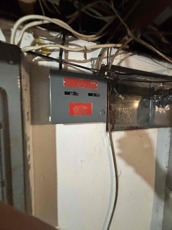 Conducted comprehensive assessment of electrical system in preparation for potential furnace replacement. Inspected existing electrical panel to evaluate capacity for supporting new HVAC equipment, noting current 80k BTU Carrier unit requiring replacement in 1400sf home. Documented electrical infrastructure with photos to ensure proper planning for future installation.