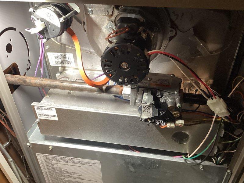 Performed annual furnace maintenance service as part of customer's membership agreement. Conducted comprehensive inspection of all internal components including blower motor, electrical connections, control board, and ductwork. System is functioning properly with no issues detected; documented condition with photos of internal components for service record.