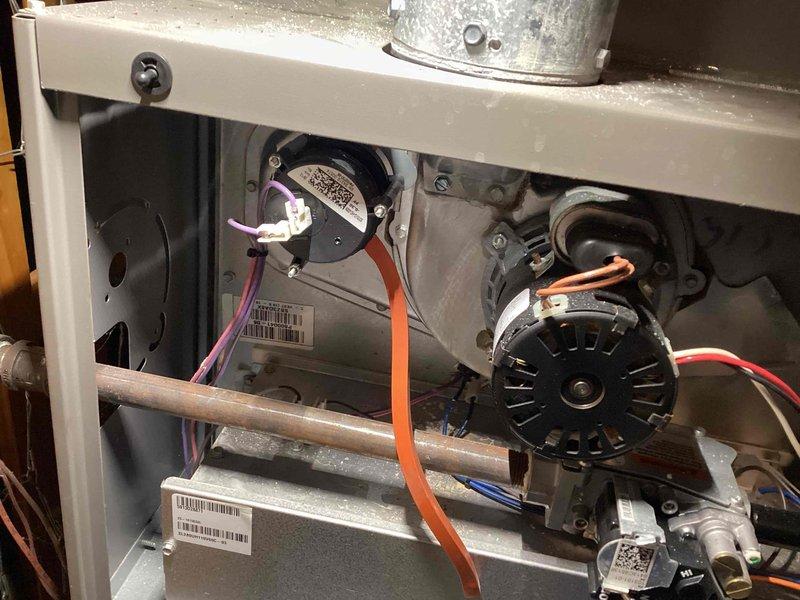 Performed annual furnace maintenance service as part of customer's membership agreement. Conducted comprehensive inspection of all internal components including blower motor, electrical connections, control board, and ductwork. System is functioning properly with no issues detected; documented condition with photos of internal components for service record.