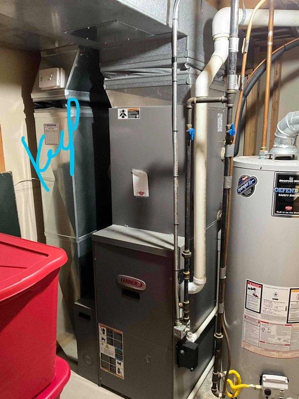 Conducted assessment for BOGO replacement quote of 17-year-old HVAC system in basement, where furnace is operational but AC unit has failed. Documented existing installation consisting of Lennox furnace with connected ductwork, water heater system, and associated PVC drainage pipes and copper piping. Customer qualifies for senior discount.