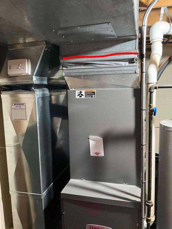 Conducted assessment for BOGO replacement quote of 17-year-old HVAC system in basement, where furnace is operational but AC unit has failed. Documented existing installation consisting of Lennox furnace with connected ductwork, water heater system, and associated PVC drainage pipes and copper piping. Customer qualifies for senior discount.