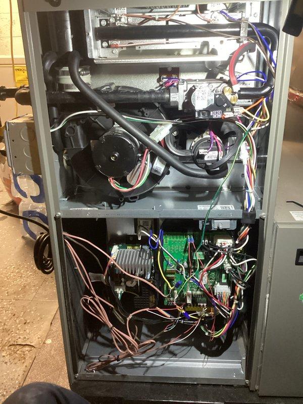 Performed annual furnace maintenance as part of customer's membership program. Inspected internal components including motor assembly, wiring connections, and control board - all functioning properly. Verified thermostat operation (Lennox digital model) which was correctly maintaining heating parameters with system set to "Heat to 79°F" at 73°F current temperature.