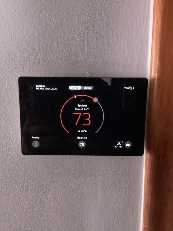 Performed annual furnace maintenance as part of customer's membership program. Inspected internal components including motor assembly, wiring connections, and control board - all functioning properly. Verified thermostat operation (Lennox digital model) which was correctly maintaining heating parameters with system set to "Heat to 79°F" at 73°F current temperature.
