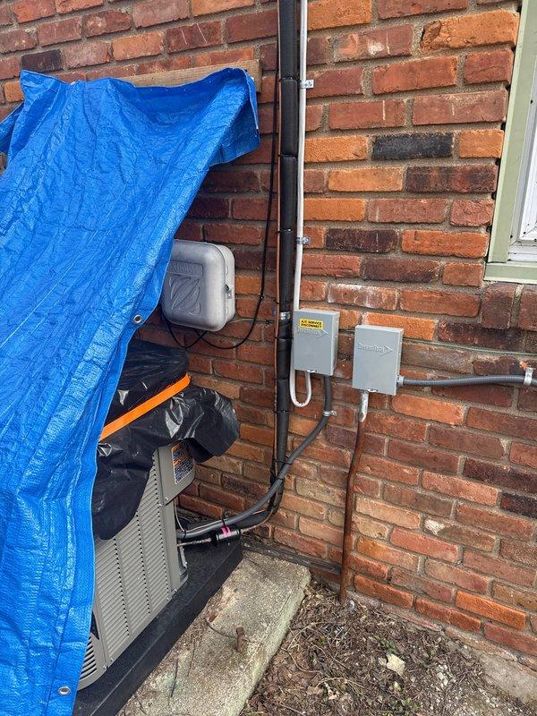 Completed insulation of suction line per violation repair requirements. Inspected outdoor unit installation with proper electrical connections to the 2-ton AC system. Verified all mechanical and electrical components are functioning correctly following the furnace and AC installation.
