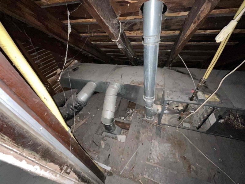 Conducted comprehensive estimate for replacement of aging HVAC system (approximately 20+ years old) including new furnace and air conditioning unit under promotional offer. Current equipment is operational but located in basement with additional unit on third floor. Visual inspection revealed unfinished spaces with exposed ductwork, aging wooden structural elements, and some water damage that may require attention during installation. Natural gas fuel source confirmed for furnace replacement.