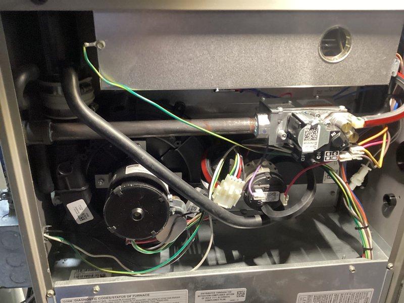 Performed annual furnace maintenance on homeowner's system through Air Care Membership. Conducted comprehensive inspection of furnace components including motor assembly, gas valve, electrical connections, and venting system with proper PVC connections. All systems tested and functioning normally; no issues identified during the preventative maintenance service.