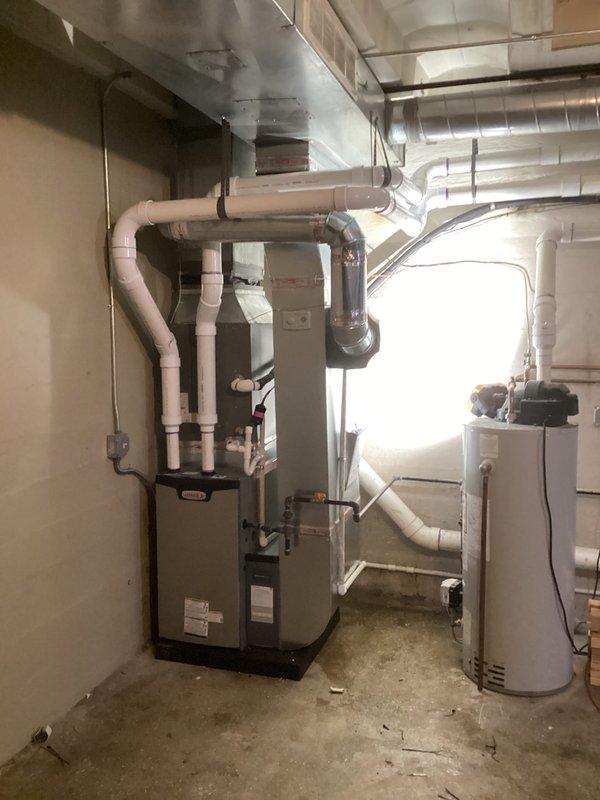 Successfully completed installation of new furnace unit (model 126376-02, Option 3) with proper PVC ventilation system connected to existing ductwork. All permits were requested, and the system was properly connected and tested for operation. Installation included complete integration with existing HVAC infrastructure in the utility room alongside the water heater.