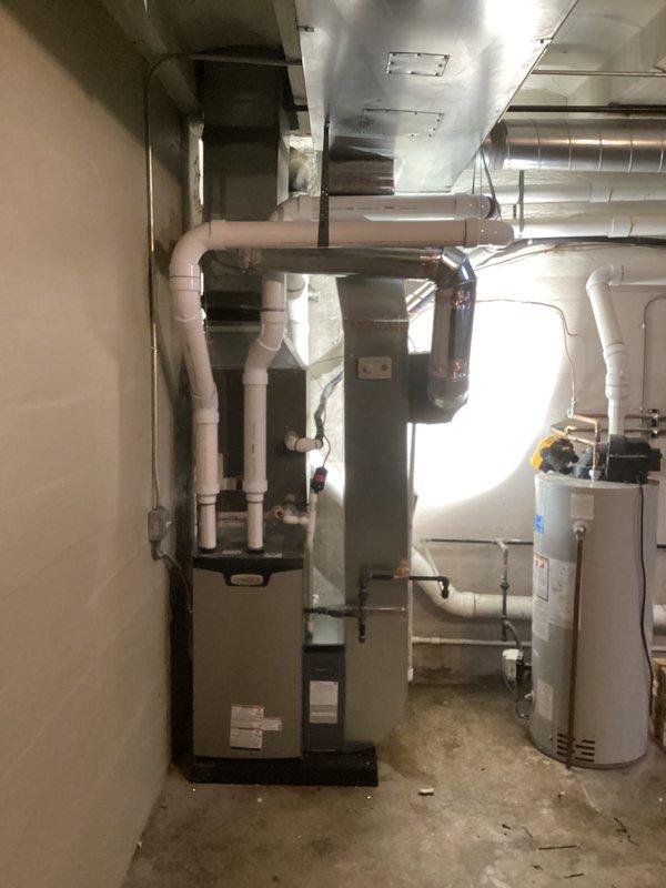Successfully completed installation of new furnace unit (model 126376-02, Option 3) with proper PVC ventilation system connected to existing ductwork. All permits were requested, and the system was properly connected and tested for operation. Installation included complete integration with existing HVAC infrastructure in the utility room alongside the water heater.