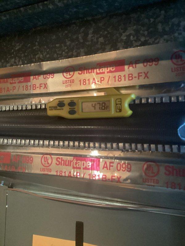 Performed routine maintenance tune-up on 4-year-old forced air furnace system. Inspected outdoor condenser unit showing normal weathering and measured supply air temperature at 47.8°F using digital thermometer. System functioning properly with no issues identified; next maintenance recommended in 2025.