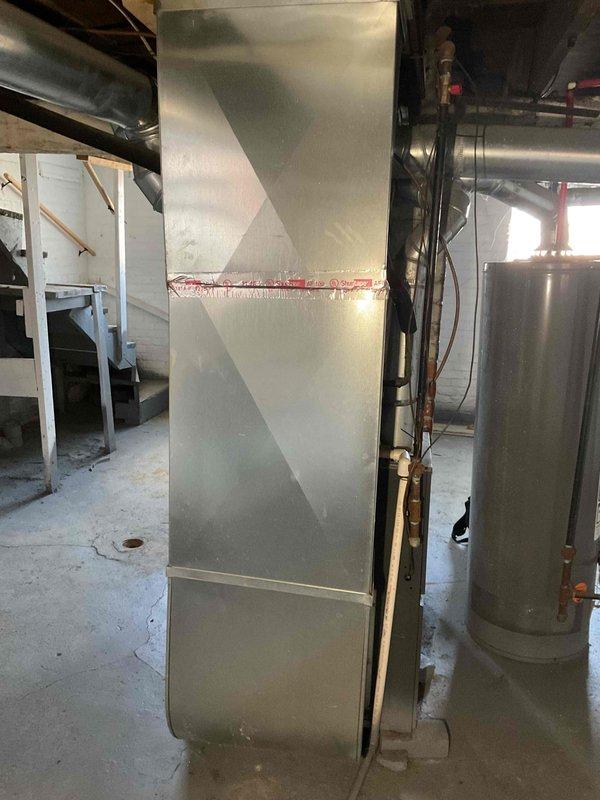 Conducted site visit to assess non-operational furnace in basement. Inspection revealed aging natural gas furnace with visible wear on connection points and ductwork. Customer previously scheduled for system replacement but cancelled; recommended proceeding with previously quoted furnace replacement due to complete system failure.