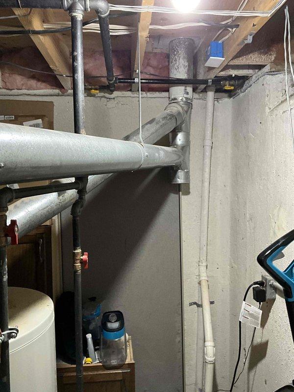 Completed inspection of 23-year-old Bryant gas furnace and AC system in unfinished basement requiring full replacement. System shows significant age-related deterioration with outdated components visible in the mechanical room where furnace is installed alongside Envirotec water treatment system. Customer requires additional plumbing estimate; comprehensive HVAC replacement proposal prepared for both furnace and air conditioning units.