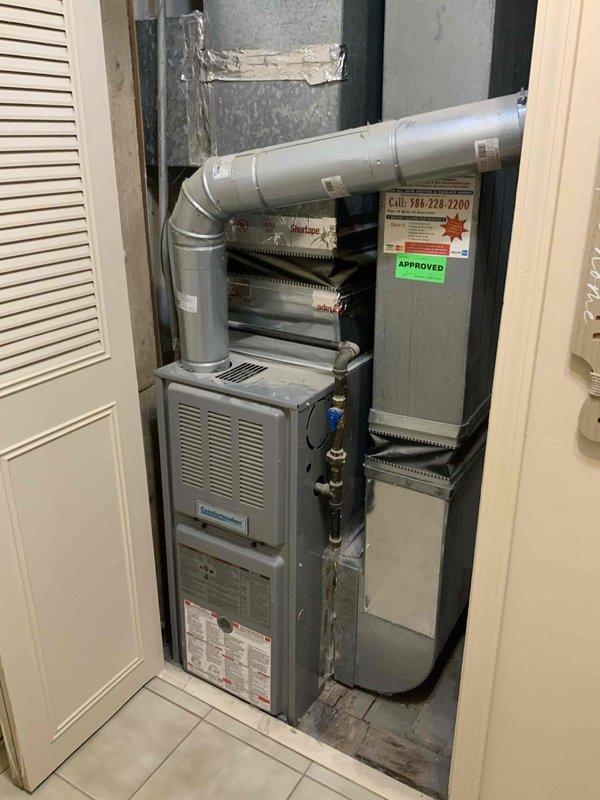 Provided estimate for replacement of 15-year-old furnace and non-functioning A/C system located in utility room. Inspection revealed existing installation with copper plumbing connections and vertical ductwork that would need to be integrated with new equipment. Quote #126478-01 prepared after thorough assessment of the space constraints and current system configuration.
