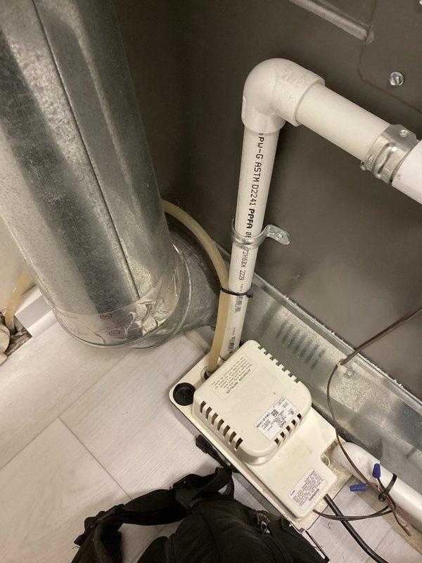 Responded to service call for furnace making thumping noise upon shutdown. Performed diagnostic inspection on 7-year-old unit located at rear of ranch home. Inspected blower assembly, exhaust components, and electrical connections. Checked PVC drainage system and control module functionality. Replaced air filter as requested during annual heating maintenance service. System now operating normally with no unusual shutdown noises.