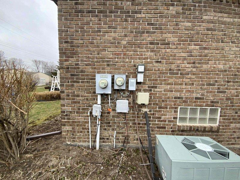 Performed comprehensive evaluation for full HVAC system replacement on 16-year-old furnace and AC unit. Inspected existing outdoor condensing unit and assessed utility connections. Customer requires installation within one month and has also requested new water heater replacement. Photos documented current equipment condition and installation area for proper system sizing and configuration planning.