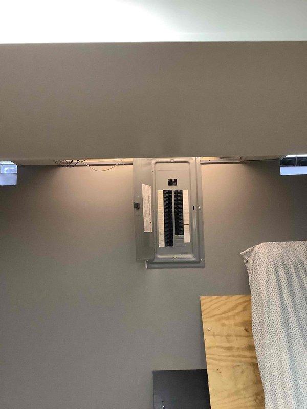 Performed site evaluation for Generac generator installation. Assessed electrical panel configuration, noting existing circuit breakers and available space for integration. Documented current wiring setup and structural conditions to determine optimal generator placement and connection requirements.