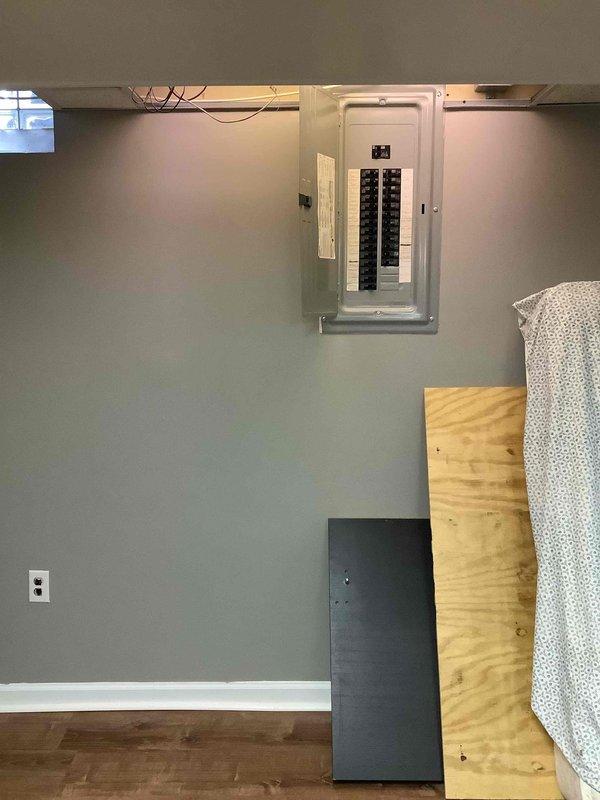 Performed site evaluation for Generac generator installation. Assessed electrical panel configuration, noting existing circuit breakers and available space for integration. Documented current wiring setup and structural conditions to determine optimal generator placement and connection requirements.