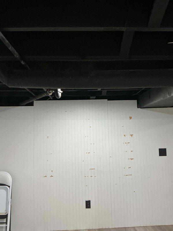 Conducted in-home estimate for customer interested in comparing installation options between traditional central AC and mini-split system for a property with no existing cooling. Inspection revealed an unfinished basement area with exposed ceiling structure and existing ductwork connected to a furnace unit, which could potentially accommodate a traditional central AC system with proper modifications.
