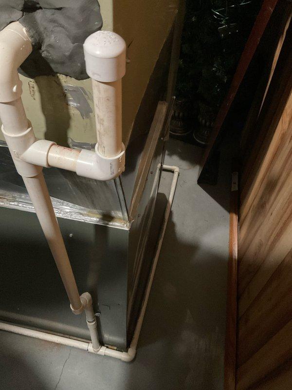 Conducted comprehensive evaluation of 16-year-old residential HVAC system for potential full replacement. Inspected existing furnace showing significant cabinet deterioration and wear on upper section. Examined PVC ventilation system and condensate drainage components, noting current installation configuration for proper replacement specifications. Customer previously received quote for A/C replacement only, but is now requesting complete system estimate for both heating and cooling components.