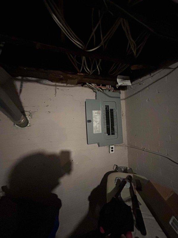 Performed detailed inspection of 40+ year old non-functional Waterbury natural gas furnace located in basement. Documented extensive age-related deterioration and wear on internal components. Evaluated electrical service panel and existing ductwork configuration for replacement compatibility. Recommended complete system replacement with new furnace and air conditioning unit per promotional bundle offering.