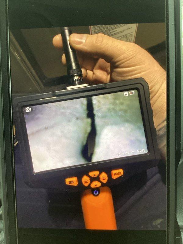 # Service Summary

Responded to service call for furnace making rattling noise upon startup. Performed diagnostic inspection of 2024 furnace unit located in basement. Conducted thorough examination of internal components including gas valve assembly, electrical connections, and mounting hardware to identify source of rattling. Utilized inspection camera to examine heat exchanger and internal ductwork for any loose components or debris. Verified all wire connections, grommets, and mounting brackets were secure. Completed Annual Heating Maintenance (AHM) as requested, including inspection of burner assembly, flame sensor, blower motor, and all electrical connections. All components found to be properly secured and functioning within normal parameters. Unit operating quietly with no abnormal sounds detected after inspection and maintenance completion.