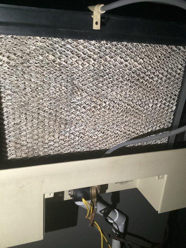 # Service Summary

Technician Sam completed a humidifier service call requiring a follow-up repair. Initial inspection identified a faulty humidifier tube (part #4335) that needed replacement. Photos documented the HVAC system's evaporator coil assembly and air filtration components within the air handler unit. The work has been scheduled for completion with the replacement tube to be installed during a return visit under PO #1294942.