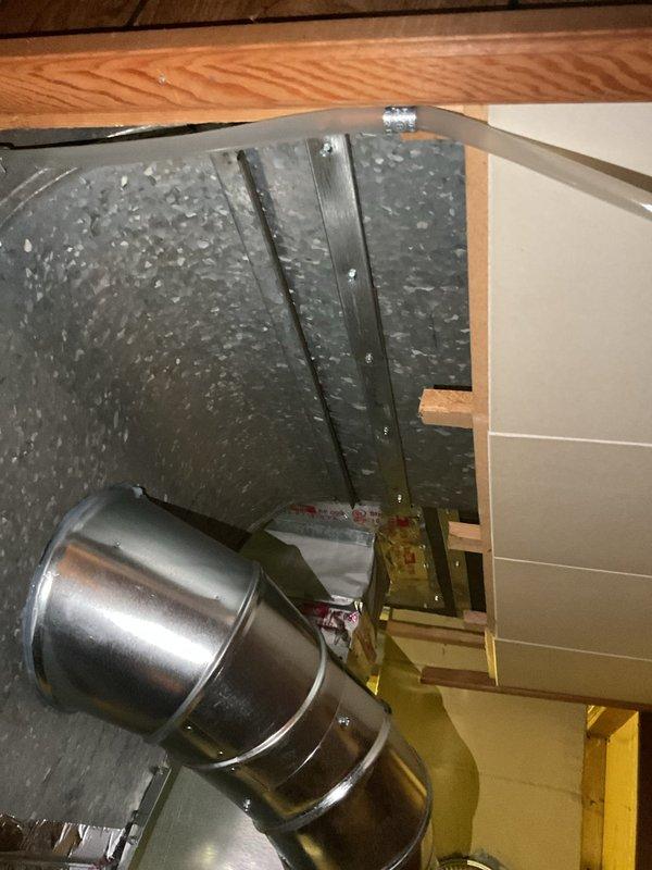 # Service Report

Responded to service call for furnace displaying red flashing light on 3-month-old unit that was still providing heat. Upon arrival, performed diagnostic inspection of furnace and associated ductwork system. Conducted visual examination of HVAC installation in attic space, inspecting metal ductwork connections, insulated rectangular trunk lines, and metallic elbow transitions for proper installation and potential issues.

Evaluated furnace control board error code indicated by flashing red light sequence. Checked all electrical connections, verified proper voltage supply, and inspected safety switches including pressure switches, flame sensor, and limit controls. Tested system operation through complete heating cycle to confirm unit was functioning despite error indication.

Inspected ductwork installation including insulated rectangular trunk lines and metallic transition elbows in attic space. Verified all duct connections were secure and properly sealed. Examined i