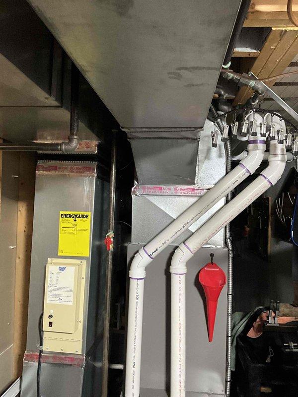 # HVAC Install - Complete System - Comm Job Summary

Completed installation of air scrubber unit to existing commercial HVAC system. Mounted and integrated air purification equipment with air handler unit in mechanical space, establishing proper connections to ductwork system. Installed necessary electrical controls and wiring to control panel, ensuring proper power supply and system integration. Routed and secured refrigerant lines and duct connections with appropriate insulation materials. Verified all mounting brackets and support hardware for secure installation. System tested and confirmed operational upon completion.