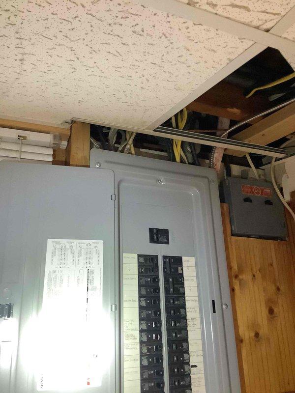 Completed electrical estimate for new whole home Generac generator installation. Site assessment conducted of existing electrical panel and utility room infrastructure to determine proper sizing, placement, and integration requirements for the generator system. Documented current electrical service configuration including main panel capacity and available breaker positions to establish transfer switch specifications and ensure adequate power distribution for automatic backup power operation.