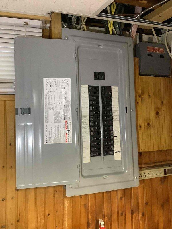 Completed electrical estimate for new whole home Generac generator installation. Site assessment conducted of existing electrical panel and utility room infrastructure to determine proper sizing, placement, and integration requirements for the generator system. Documented current electrical service configuration including main panel capacity and available breaker positions to establish transfer switch specifications and ensure adequate power distribution for automatic backup power operation.