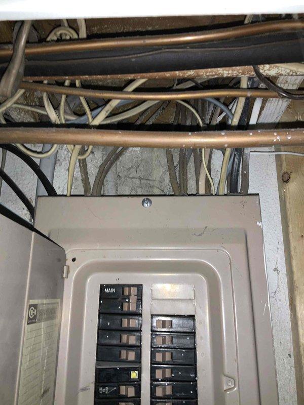 # HVAC Estimate - Full System

Conducted comprehensive full system replacement estimate for residential property with 16-year-old heating and cooling equipment. Performed thorough assessment of existing outdoor AC condenser unit and indoor mechanical systems, documenting current equipment condition, electrical infrastructure at main service panel, and existing ductwork and piping configuration in basement utility area. Customer requested quote for complete HVAC system replacement with installation timeline within one month.