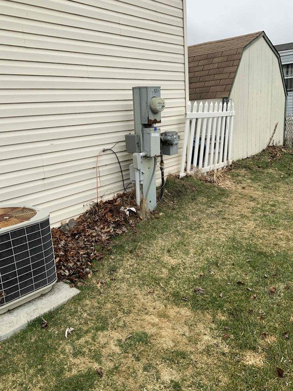 Completed comprehensive site evaluation for replacement of 26-year-old furnace and air conditioning system currently located in utility room. Assessed existing equipment configuration, electrical service capacity at panel, and exterior condensing unit placement on concrete pad adjacent to meter box. Documented current system specifications and provided detailed replacement estimate for new HVAC equipment installation.