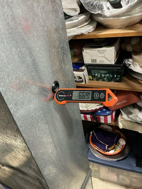 # HVAC Maintenance - ACM Service Report

Performed comprehensive annual maintenance on a 10-year-old air conditioning system. Conducted complete system inspection and tune-up procedures to ensure optimal performance and efficiency for the cooling season.

## Work Performed

Inspected and evaluated all major system components including condenser unit, evaporator coil, and air handling equipment. Removed and examined air filter, which showed heavy accumulation of dust, dirt, and debris throughout the mesh surface, indicating extended use period. The filter media displayed significant clogging with grayish-brown particulate matter covering most of the surface area, restricting proper airflow.

Measured system temperatures using digital thermometer to verify proper refrigerant charge and heat transfer. Recorded supply air temperature reading of 50.3°F at the ductwork, confirming adequate cooling performance and proper system operation. Checked refrigerant lines for proper insulation and co