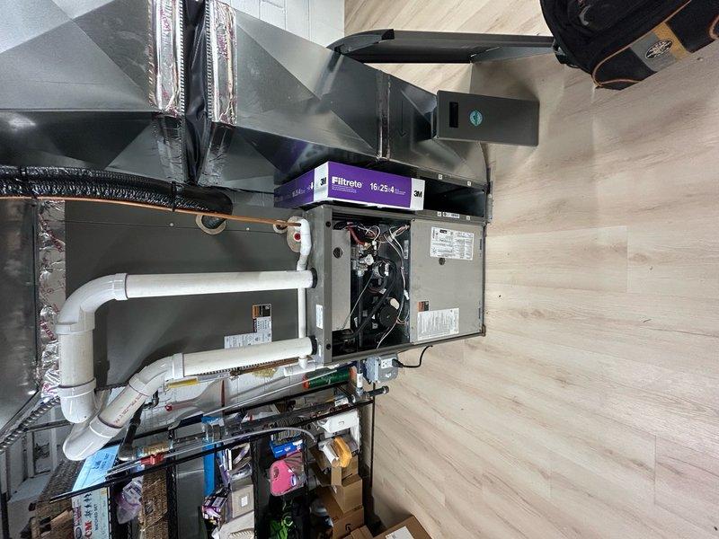 # HVAC Maintenance - AHM Service Report

Completed annual heating maintenance on 10-year-old furnace as part of scheduled membership service. Upon arrival, customer confirmed unit had been operating properly with no issues reported since previous service visit. Performed comprehensive tune-up inspection and testing of furnace system located in garage utility area.

Conducted electrical diagnostics using digital clamp meter to verify proper amperage draw and voltage supply to blower motor and system components. All electrical readings were within manufacturer specifications. Inspected air handler unit, ductwork connections, and PVC condensate drain lines for proper installation and function. Verified 16x25x4 media filter was in acceptable condition with adequate airflow. 

Examined internal wiring, control board connections, and safety devices during service panel access. Tested system operation through full heating cycle to confirm proper ignition sequence, burner operation, and blower