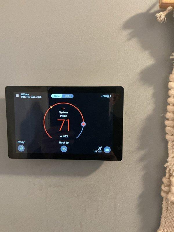 # Service Summary

Responded to service call for furnace with continuously running fan on approximately 2.5-year-old forced air system that was still producing heat. Arrived during scheduled morning appointment window and performed diagnostic evaluation of heating system and thermostat controls.

## Work Performed

Upon arrival, inspected Lennox thermostat programming and system settings to identify cause of continuous fan operation. Verified thermostat was functioning properly and displaying accurate temperature readings with system set to heat mode. Examined fan control settings and determined fan was set to continuous operation rather than automatic cycling with heating calls. Adjusted thermostat fan settings from "ON" to "AUTO" mode to correct continuous operation issue. Verified system responded appropriately to thermostat commands with fan cycling properly during heating cycles. Confirmed furnace was producing adequate heat and operating within normal parameters. System tested su