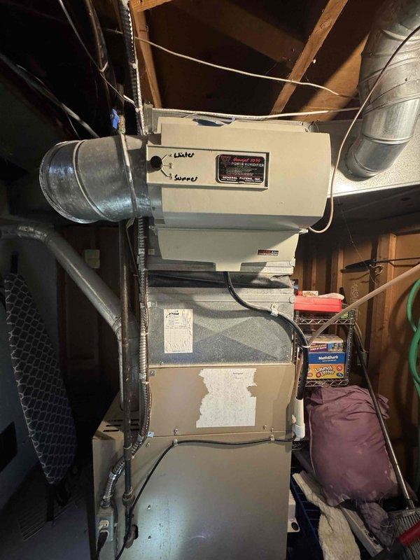 # HVAC Estimate - Full System

Conducted comprehensive system evaluation for residential HVAC replacement. Assessed existing 16-year-old air conditioning unit and furnace installation located in basement utility area. Documented current equipment condition showing age-related wear on furnace cabinet panels and exterior condenser unit mounted on concrete pad. Provided full system replacement estimate including both cooling and heating equipment options to address customer's request for complete HVAC system upgrade within current season timeframe.