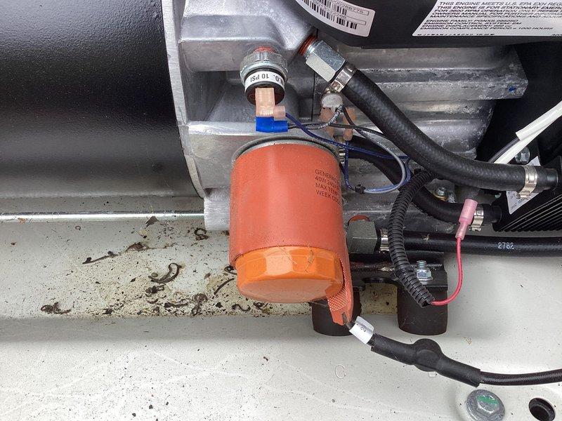 # Generator Maintenance Service Report

Performed scheduled preventive maintenance on a 26kW Generac standby generator system. Conducted comprehensive inspection of the generator unit, including visual examination of all mechanical components, electrical connections, and control systems. Verified proper operation of the automatic transfer switch and documented circuit breaker panel configuration with updated labeling for load management. Inspected cooling system components, fuel delivery system, and battery connections to ensure optimal performance and reliability. All systems tested and found operating within manufacturer specifications, with unit ready for automatic operation during power outages.