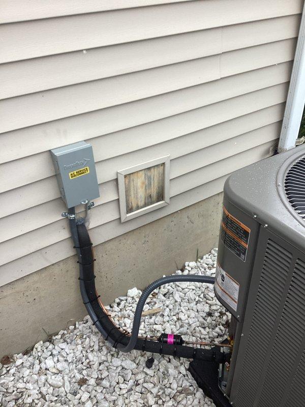 # HVAC Installation Summary

Successfully completed installation of a 3.5-ton Lennox air conditioning system with matching evaporator coil and hot water heater replacement. Secured all required mechanical, electrical, and air conditioning permits prior to installation. Unit positioned on rear of property with proper gravel pad installation for drainage and equipment support. Installed electrical disconnect box with appropriate conduit and line set routing from outdoor condensing unit to indoor coil location. Completed all electrical reconnections per code requirements. System tested and verified operational upon completion. All manufacturer labels and warning decals properly affixed to equipment. Installation financed through third-party financing with customer identification documented on file.