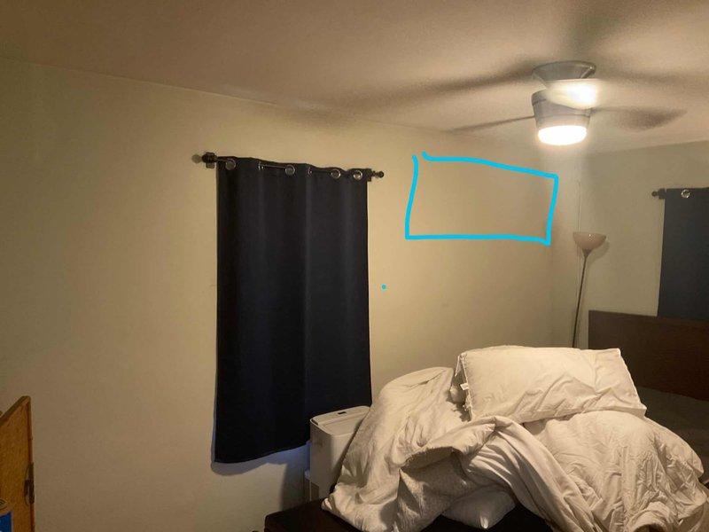 # HVAC Estimate - Mini Split Installation

Conducted on-site assessment for new Mitsubishi mini split system installation in a residential property. Customer requested climate control for two separate rooms: a bedroom and an adjacent living space. Evaluated wall locations and electrical requirements for indoor air handler placement in both zones. Photographed proposed mounting locations above bed area in primary bedroom and identified secondary installation point in living area near entertainment center. Assessed structural considerations, clearance requirements, and optimal positioning for efficient air distribution in both rooms. Provided estimate for complete two-zone mini split system including outdoor condenser unit, indoor wall-mounted air handlers, refrigerant line sets, condensate drainage, and electrical connections.