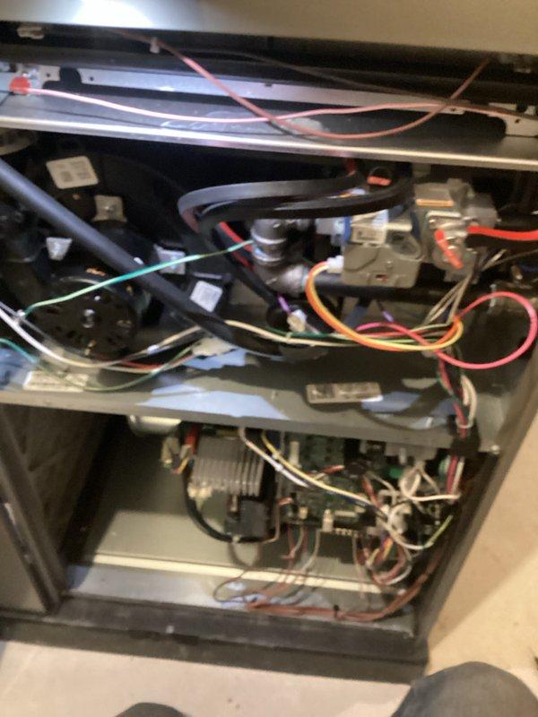 # Annual Heating Maintenance Summary

Completed comprehensive annual heating maintenance on 10-year-old residential gas furnace. Performed full system tune-up including inspection of all major components: heat exchanger, burner assembly, gas valve, inducer motor, blower motor, and electrical connections. Verified proper operation of all safety controls and limit switches. Cleaned burners, inspected flue piping, and tested gas pressure at manifold. Checked and tightened all electrical connections throughout the system. Examined wiring harnesses for signs of wear or damage. Confirmed proper inducer motor operation and verified draft pressure. Inspected blower wheel and motor bearings for wear. Tested thermostat communication and system cycling. Changed air filter and verified adequate airflow throughout system. All components found to be operating within manufacturer specifications with no issues identified. System tested under full heating load and confirmed proper ignition sequence, fl