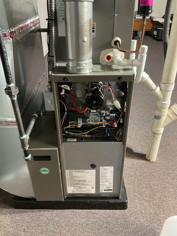 Completed comprehensive Air Care Heating and Cooling maintenance service on residential HVAC system including gas furnace and outdoor heat pump unit. Performed full system inspection with access panel removal to examine internal components, blower motor, electrical connections, control boards, and venting system; verified proper operation of all mechanical and electrical components. Conducted exterior condenser unit evaluation with diagnostic testing using handheld measurement tools to assess system performance and efficiency.