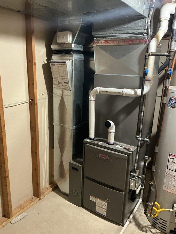 # HVAC Complete System Installation

Successfully completed installation of a complete HVAC system consisting of a 90,000 BTU furnace and 3.5-ton air conditioning unit with rear discharge configuration. The installation included all necessary mechanical and electrical connections, with proper ductwork integration featuring reinforced plenum construction. PVC condensate drainage and venting systems were installed to manufacturer specifications. All existing gas, electrical, and refrigerant lines were reconnected to the new equipment. Required mechanical and electrical permits were obtained prior to installation. System was tested and verified operational upon completion.