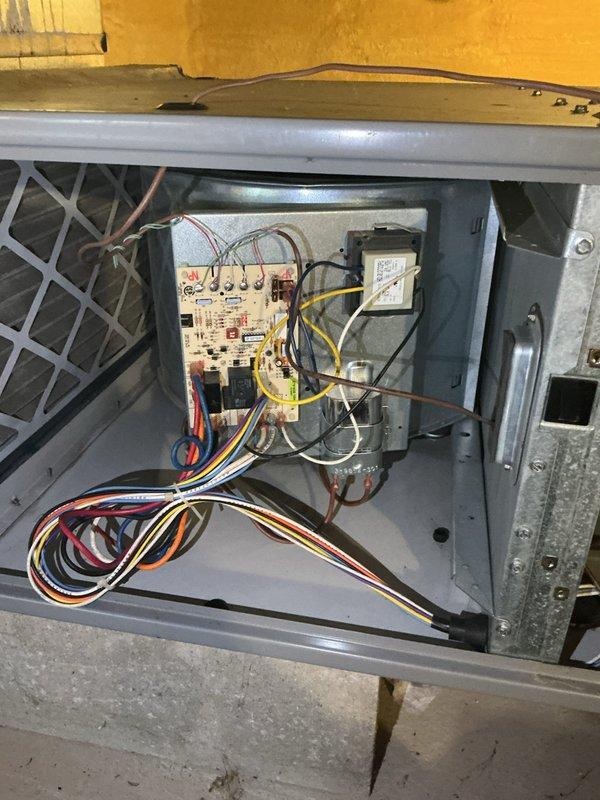 # Service Report: No Heat Call - Forced Air Furnace

Responded to no heat call where furnace was short cycling, turning on briefly then shutting down immediately. Upon arrival, performed diagnostic evaluation of forced air heating system located in basement area. Removed access panel to inspect internal electrical and control components. 

Identified intermittent flame sense or ignition control issue causing safety lockout. Inspected circuit board, control module, and associated wiring harnesses for loose connections, signs of overheating, or component failure. All wire terminations checked and found secure with proper color-coded low and line voltage circuits intact.

Tested ignition sequence and flame sensor operation. Cleaned flame sensor rod to ensure proper flame rectification signal. Verified proper gas valve operation and burner assembly condition. Checked all safety controls including limit switches and rollout switches for proper function.

System restored to normal operation 