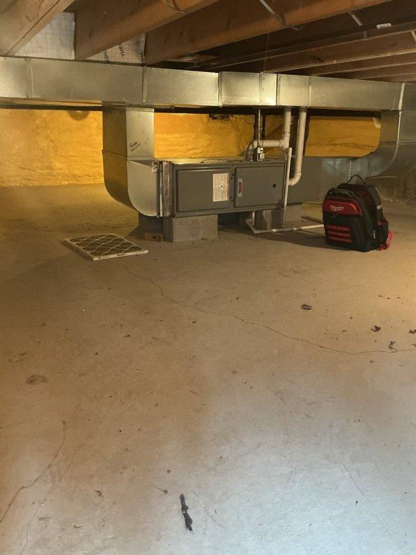 # Service Report: No Heat Call - Forced Air Furnace

Responded to no heat call where furnace was short cycling, turning on briefly then shutting down immediately. Upon arrival, performed diagnostic evaluation of forced air heating system located in basement area. Removed access panel to inspect internal electrical and control components. 

Identified intermittent flame sense or ignition control issue causing safety lockout. Inspected circuit board, control module, and associated wiring harnesses for loose connections, signs of overheating, or component failure. All wire terminations checked and found secure with proper color-coded low and line voltage circuits intact.

Tested ignition sequence and flame sensor operation. Cleaned flame sensor rod to ensure proper flame rectification signal. Verified proper gas valve operation and burner assembly condition. Checked all safety controls including limit switches and rollout switches for proper function.

System restored to normal operation 