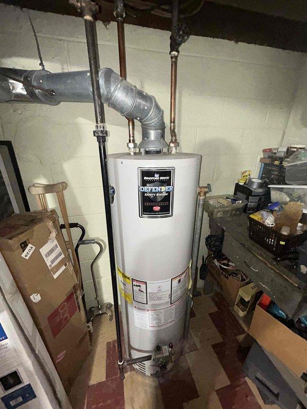 # HVAC Estimate - Replacement Summary

Completed comprehensive assessment for replacement of existing 15-year-old furnace and air conditioning system. Customer requested installation within next month timeframe. Evaluated current equipment condition and documented existing basement installation including humidifier integration and ductwork configuration. Photographed water heater clearances, existing HVAC components, furnace location, humidifier unit with connected metallic ductwork, and overall mechanical room layout to facilitate accurate replacement quote preparation. Provided detailed estimate for complete system replacement addressing both heating and cooling equipment that have reached end of expected service life.