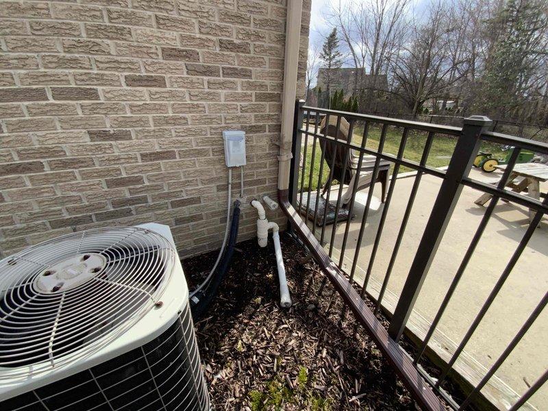 # HVAC Estimate - Full System Replacement

Conducted comprehensive assessment and provided detailed estimate for complete residential HVAC system replacement. Existing system has reached end of service life at 26 years old, requiring full equipment upgrade including outdoor condensing unit, indoor air handler, thermostat controls, and associated electrical components.

## System Evaluation

Evaluated current outdoor condensing unit located on elevated patio area with mulch base and PVC condensate drainage. Inspected electrical service panel and existing circuit breaker configuration to determine compatibility requirements for new equipment installation. Documented existing system placement, electrical infrastructure, and site conditions to develop accurate replacement specifications.

## Scope of Work - Estimate Provided

**Outdoor Equipment Replacement:**
- Remove existing 26-year-old condensing unit from patio location
- Install new high-efficiency outdoor condensing unit with proper