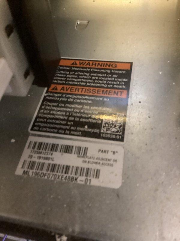 # HVAC Install - Complete System

## Job Description

Completed full HVAC system installation including 70,000 BTU furnace and 2-ton air conditioning unit with rear discharge configuration. Installed new humidifier and established dedicated electrical circuit to support system requirements. Secured all necessary mechanical and electrical permits prior to installation. System components properly labeled with manufacturer identification and safety warnings per code requirements. Exterior electrical service modifications completed including conduit installation and meter connections to accommodate new HVAC load.